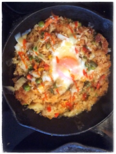 Fried rice with green beans, peas, carrots, sauerkraut and eggs